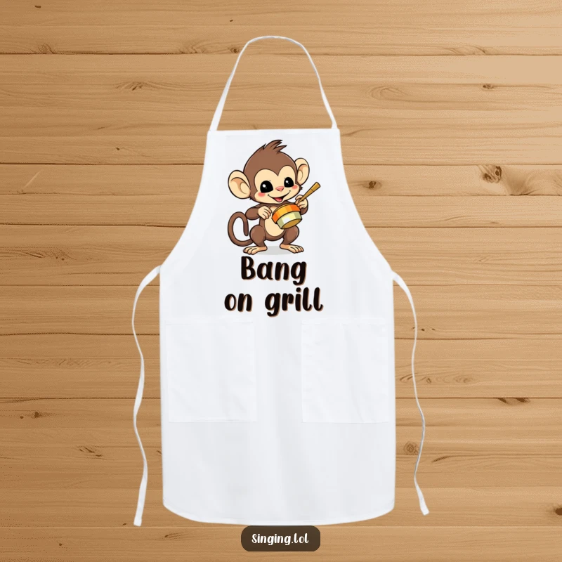 Funny apron with a mischievous monkey character playing cymbals, perfect for energetic cooking.