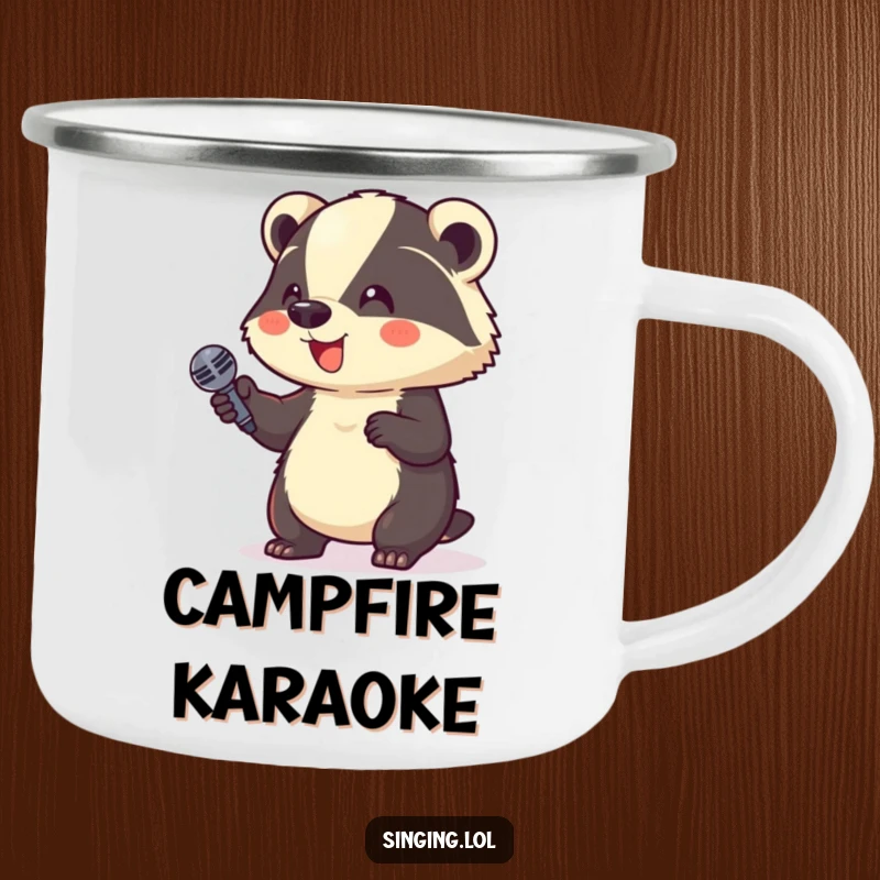 Funny Camping Mug: A giggling badger holds a microphone, a humorous enamel cup for outdoor comedy fans.
