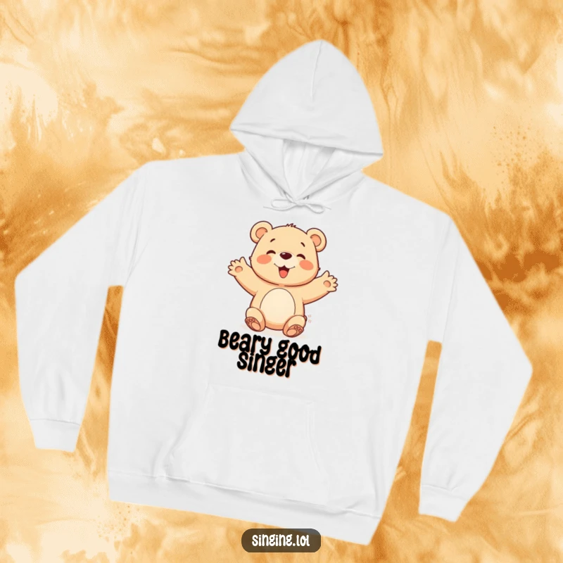 Funny happy bear cub character with open arms, joining a chorus, featured on a cozy hoodie for warm, humorous vibes.