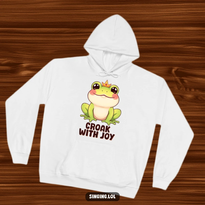 Funny Frog Prince hoodie featuring a giggling royal frog character croaking a happy tune, perfect for cozying up with a smile.