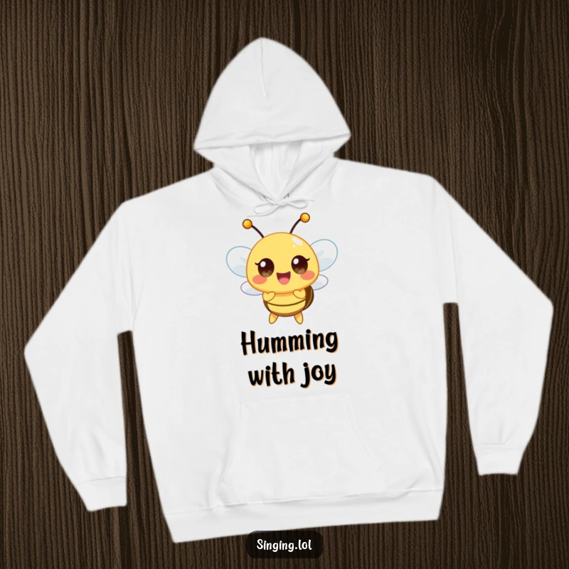 Funny hoodie featuring a happy bee character buzzing a high note, perfect for cozy, musical moments outdoors or in.