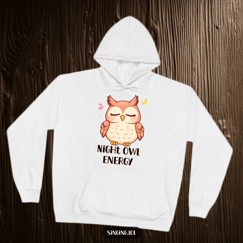 Funny owl hoodie featuring a happy character peacefully hooting a lullaby with closed eyes, perfect for ultimate relaxation.