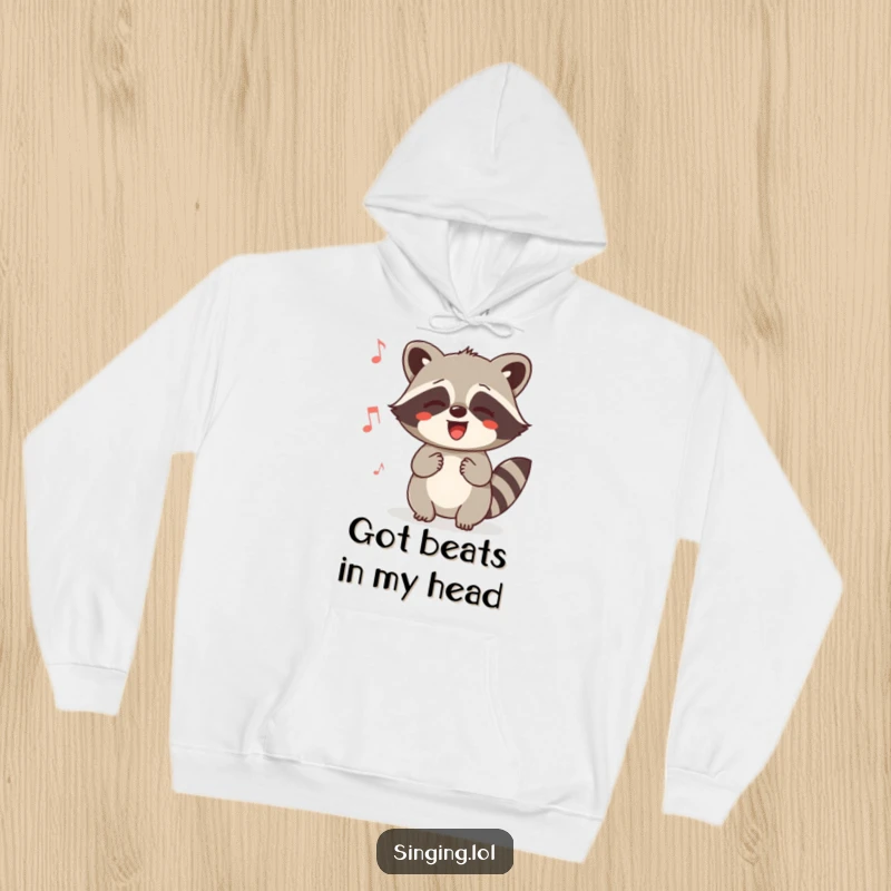 Funny Raccoon Humming Hoodie: A content raccoon humming a melody, perfect for staying warm and cheerful. Soft, cozy, and full of personality.