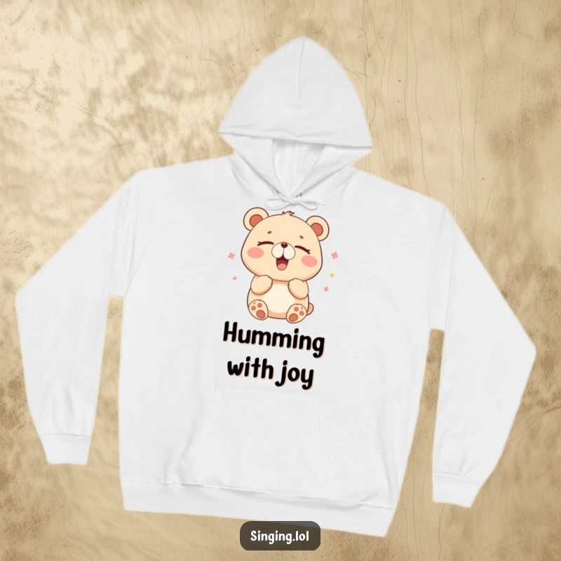 Funny hoodie with a happy bear humming contentedly with closed eyes, perfect for cozy, peaceful moments.