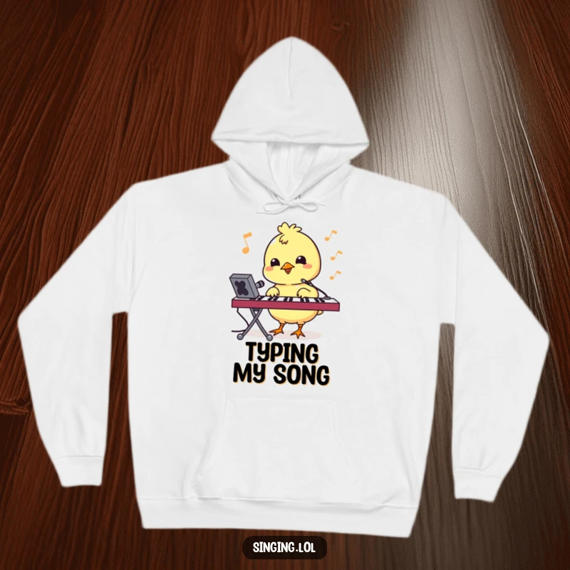 Funny hoodie featuring a bouncy chick character pecking at a keyboard, combining comfort with tech-inspired fun.