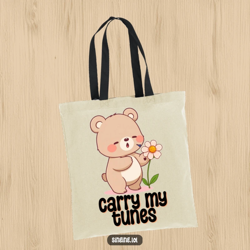 Funny tote bag featuring a small bear tapping its foot and singing into a flower, perfect for carrying items with a natural melody.