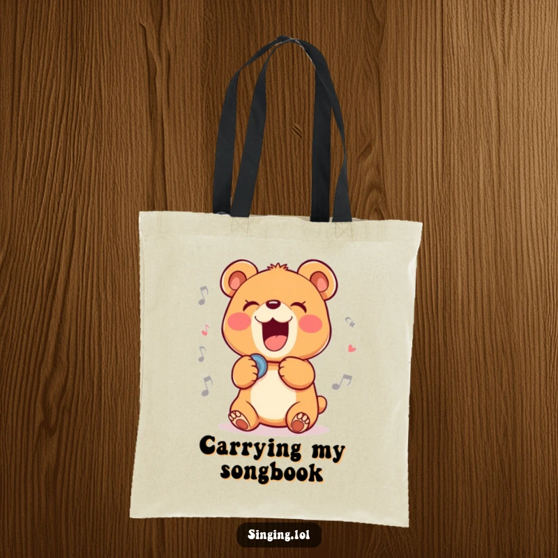 Funny tote bag featuring a delighted bear cub character belting out a ballad, ideal for carrying essentials with musical flair.